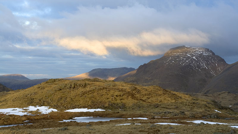 Early low light illuminates cloud layers and Great Gable Early low light illuminates cloud layers and Great Gable