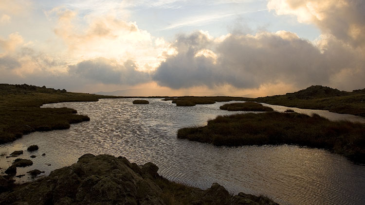 Early light & clouds on Grey Knotts tarn Early light & clouds on Grey Knotts tarn