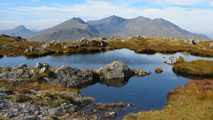 Pool on Carnedd y Cribau with the Snowdon Horseshoe Pool on Carnedd y Cribau with the Snowdon Horseshoe