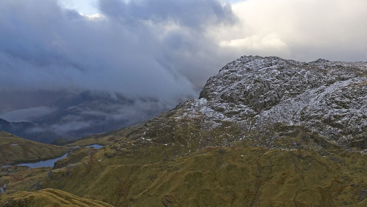 The clouds briefly clear Pavey Ark & Stickle Tarn