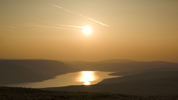 Sun sinking towards Claerwen from the pitch on Craig Dyfnant Sun sinking towards Claerwen from the pitch on Craig Dyfnant