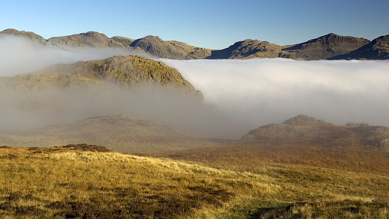 Descending into the mist towards the Hardknott Pass Descending into the mist towards the Hardknott Pass
