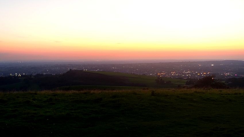 Lights of Macclesfield after sunset from Tegg's Nose pitch