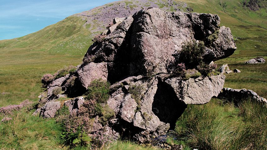 Sculpture-esque fallen boulder in the mignedd