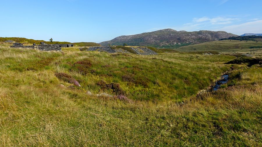 Old quarry ruins in Cwm Camlan with Y Garn beyond Old quarry ruins in Cwm Camlan with Y Garn beyond