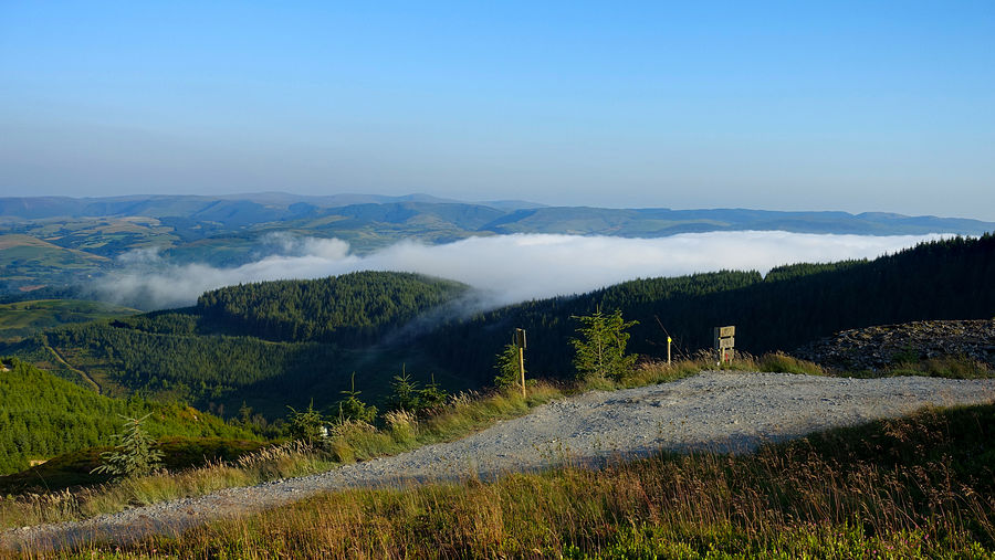 Inverted dense mist rolls inland above the Dyfi estuary Inverted dense mist rolls inland above the Dyfi estuary